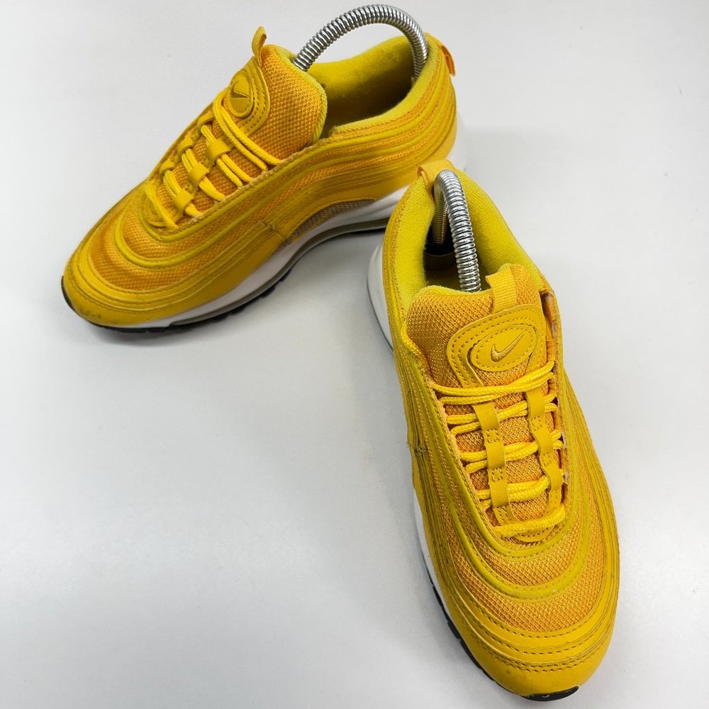 Nike Yellow Women's Athletic Sneakers re-poshing they fit a little tight on me.